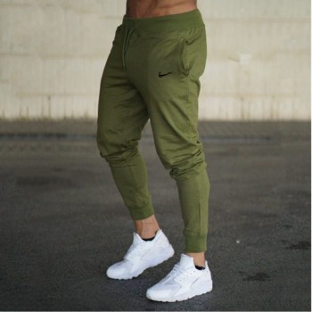 2018 New Men Joggers Brand Male Trousers Casual Pants Sweatpants Men Gym Muscle Cotton Fitness Workout hip hop Elastic Pants