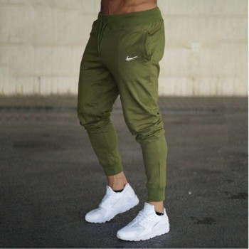 2018 New Men Joggers Brand Male Trousers Casual Pants Sweatpants Men Gym Muscle Cotton Fitness Workout hip hop Elastic Pants
