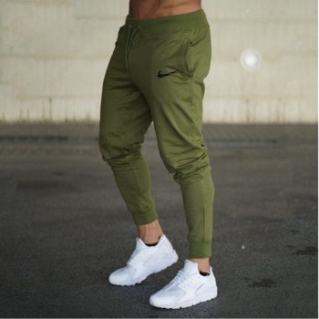 2018 New Men Joggers Brand Male Trousers Casual Pants Sweatpants Jogger grey Casual Elastic cotton GYMS Fitness Workout pan