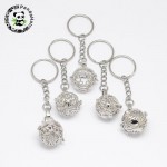 5pcs Mixed Styles Brass Hollow Ball Cage Pendant Key Chains, with Steel Split Key Rings, Lead Free amp; Nickel Free amp; Cadmium Free,
